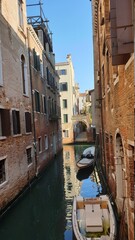Small channel and bridges in lagoon city venice at night. long.