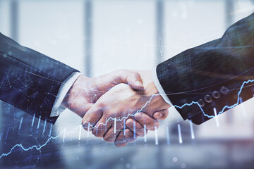 Double exposure of forex graph hologram and handshake of two men. Stock market concept.