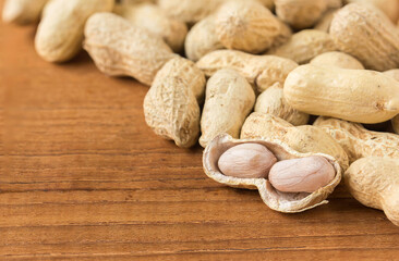 Peanuts on wood table