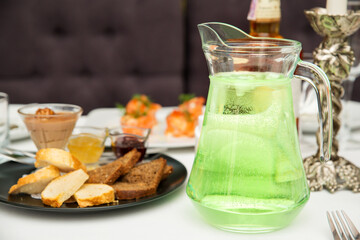 delicious refreshing summer drink in a jug. cold lemonade. close-up.