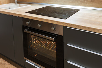 electric hob and oven in the kitchen