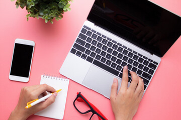 Overhead table desk View Of Businesswoman Working At Computer In Office