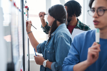Side view of the skilful future graphic designers drawing website ux app development
