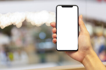 blank black phone payment through smartphone shopping mall background making show shopping for input the text on copy space