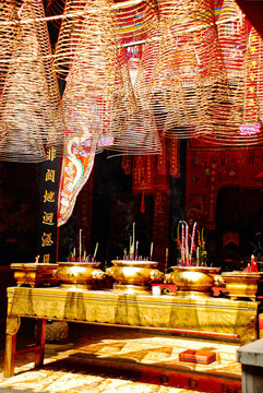 Traditional Mystic Budhist Alter With The Smoking Candles And Lamp