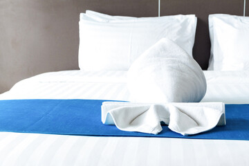 Fototapeta na wymiar Clean hotel white bed Neatness