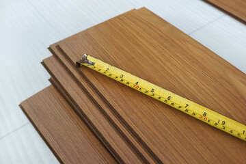 Wood parquet pieces with working tools, board for flooring.