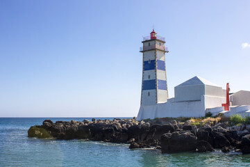 Cascais, Portugal. The Santa Marta Lighthouse, on the estuary of the River Tagus and the Cascais Bay