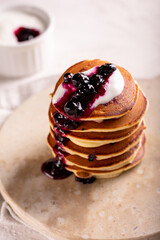 Pancakes with berry jam for breakfast