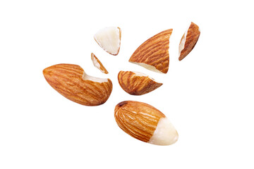 Flying almonds in the air close-up on white isolated