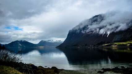 Mountains in the shadow and fjord