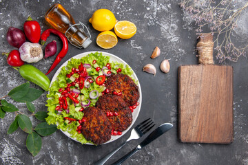 top view delicious meat cutlets with fresh salad on a grey background meal dish photo food