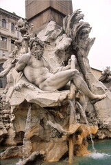 View of River god Ganges statue of the Fountain of the Four Rivers at Piazza Navona in Rome, Italy.