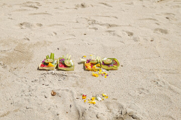 A simple Hindu offering containing several flowers