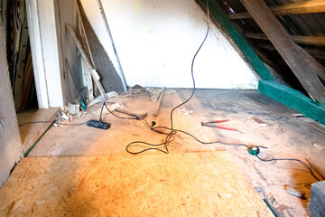 Fototapeta na wymiar Wooodworking on an attic at home