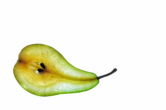 Green Pear Slice Isolated On A White Background.