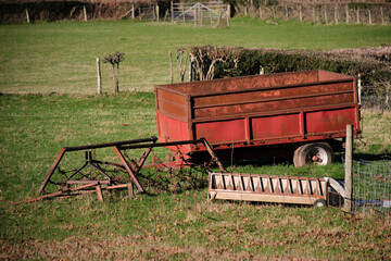 old farm equipment in field