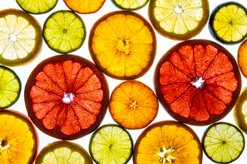 Collage of various fruit slices isolated on a white background.