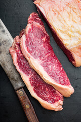 Fresh beef boneless club steak, on black background, top view