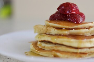 pancakes with strawberry on top