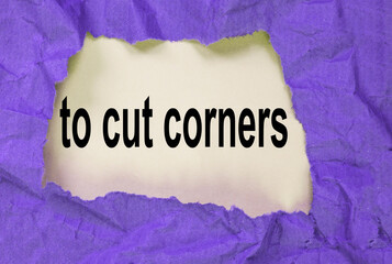 to cut corners-a message through a hole in crumpled wrapping paper, a conceptual image, a top view