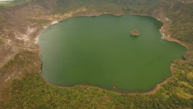 aerial footage lake crater at taal Volcano Luzon Philippines. Volcano with crater on an island in middle lake. Travel concept. Aerial video.