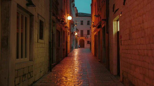 Close up view of empty streets showing architectural landmark old city. Light evening. Travel street urban traditional sidewalk outdoor. Slow motion