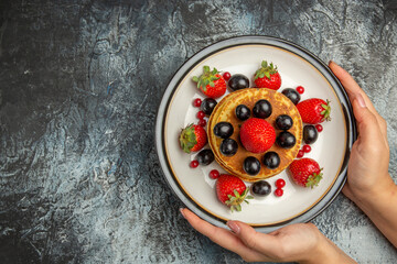 top view yummy pancakes with fresh fruits on light background fruit cake sweet