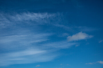 Blue sky with veil clouds