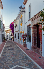 Obraz premium Narrow cobblestone street in the resort town of Marbella, Spain