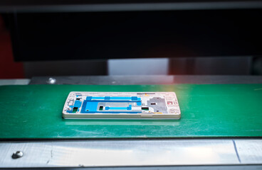intelligence machine working in mobile phone factory,Smart factory industry 4.0 concept.