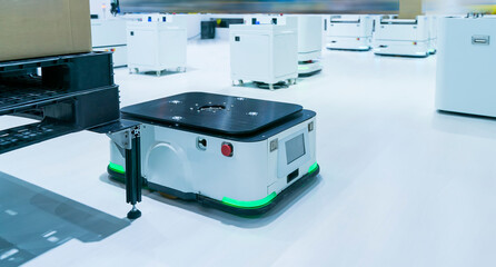 warehouse robot car carries cardboard box assembly in factory