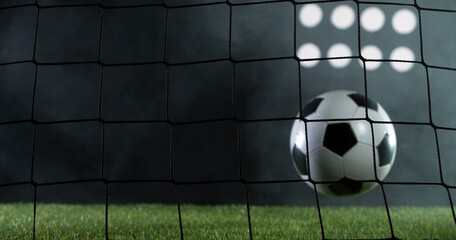 Soccer ball flying into net, goal success concept.