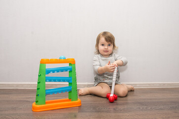 little girl playing at home. children's home games