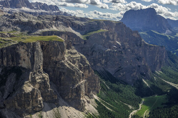 Fototapeta premium Vallunga (Long Valley) with Sassolungo and Sciliar mountain in the background, as seen from Refugio Puez, Province of Bolzano, Dolomites, South Tirol, Italy.