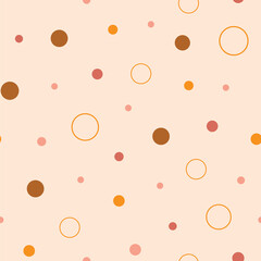Earth tones dots and circles seamless repeat pattern. Hand-drawn dots and circles in different sizes, vector illustration.