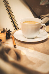 Cozy home atmosphere, a cup of hot drink