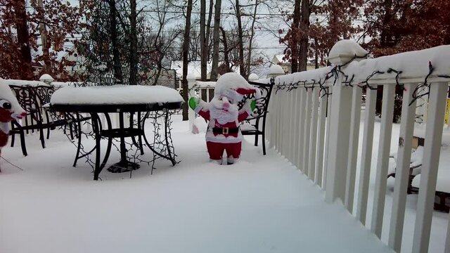 Christmas Decorations covered in snow after a snowstorm