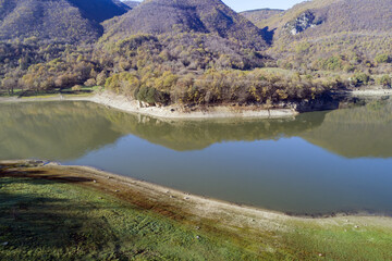 Fototapeta na wymiar Aerial view of Lake Turano in Rieti, Castel di tora, colle di tora and Ascrea lakeside villages