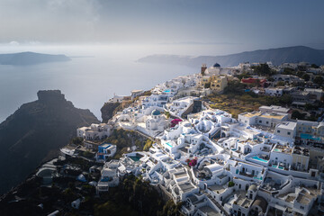 imerovigli, Santorini island with colorful volcanic cliffs and deep blue sea aerial view