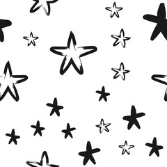 Hand drawn stars seamless texture pattern. Star doodles.