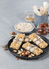 Fitness bars oatmeal nut on a plate on a light gray background