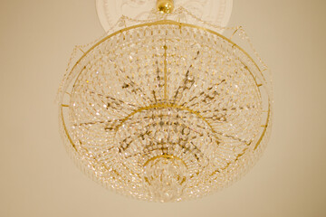 Antique chandelier on the ceiling
