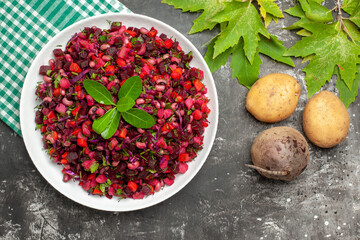 top view delicious vinaigrette beet salad inside plate on grey background health diet food