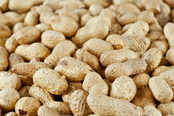 Peanuts in shell close up. Texture of nuts.