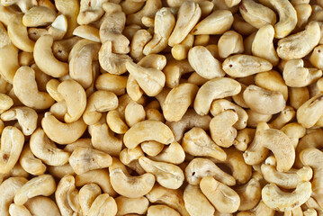Cashew close up. Texture of nuts. Lots of nuts in a pile.