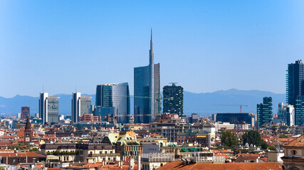 Fototapeta na wymiar Milan skyline with modern skyscrapers in Porto Nuovo business district in Italy. Panoramic view from Milan Duomo rooftop.
