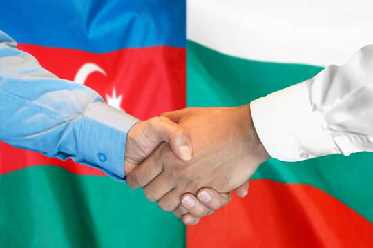 Business handshake on the background of two flags. Men handshake on the background of the Azerbaijan and Bulgaria flag. Support concept.
