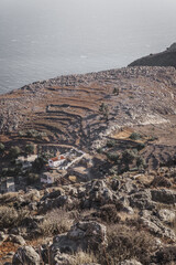Panoramic view of Livaniana village, next to Aradaina canyon, in the background Lybikon Sea
