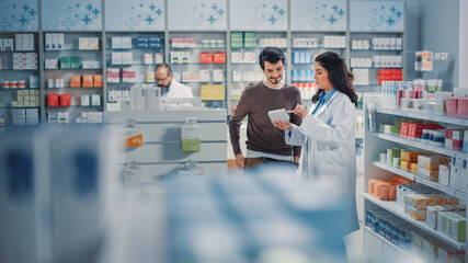 Pharmacy Drugstore: Handsome Hispanic Man Chooses to Buy Medicine, Drugs, Vitamins, Professional...